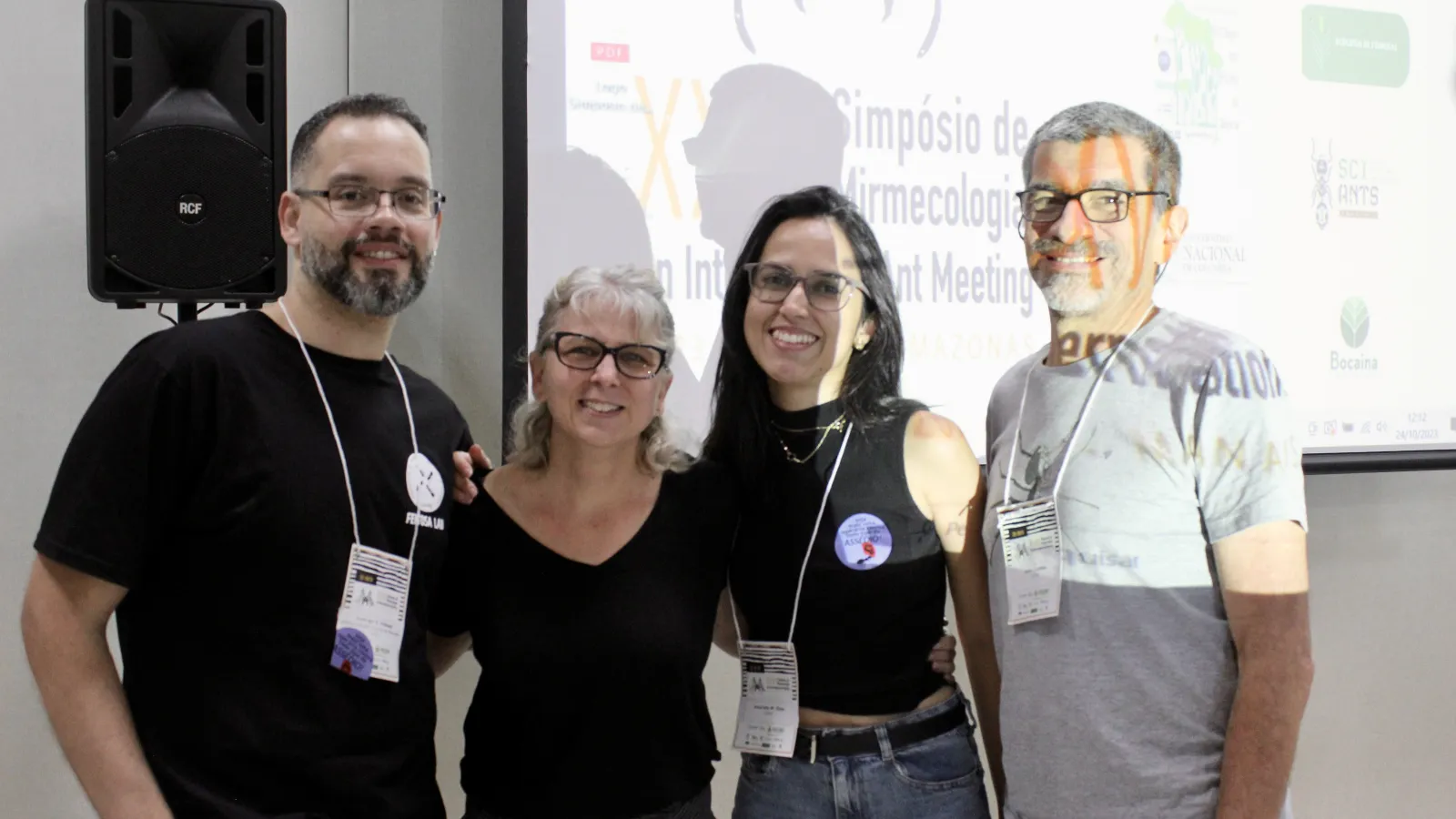 researchers in front of projector screen