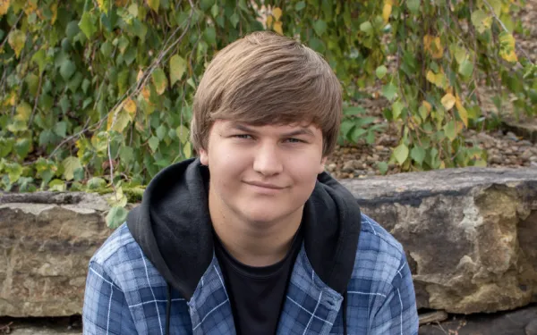 head and shoulders shot of Jesse Gunsett sitting outside